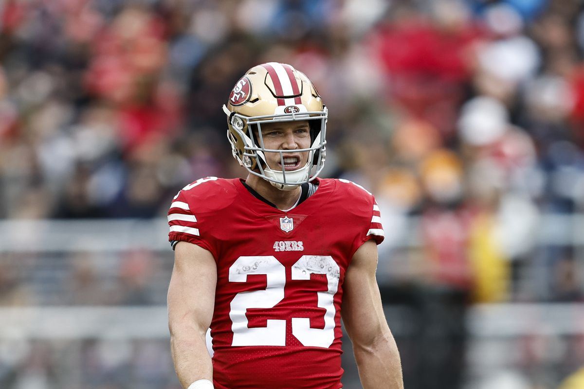 Christian McCaffrey #23 of the San Francisco 49ers reacts as he looks on during an NFL football game between the San Francisco 49ers and the Tampa Bay Buccaneers at Levi’s Stadium on December 11, 2022 in Santa Clara, California.