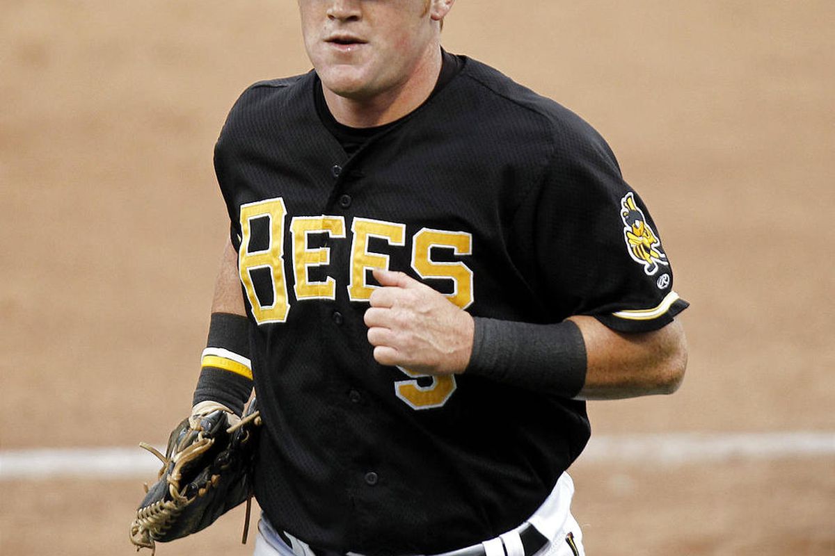 Kole Calhoun of the Salt Lake Bees runs back to the dugout after making a long throw to home from center field for the out against the Fresno Grizzlies during their match up at Spring Mobile Ballpark in Salt Lake City Friday, June 15, 2012. 