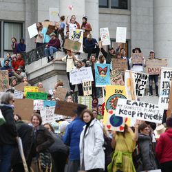 Hundreds of climate activists seeking action from local and state leaders to combat climate change rally at the Capitol in Salt Lake City on Friday, Sept. 20, 2019.
