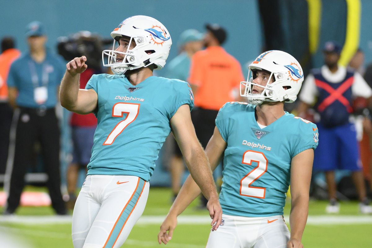 MIAMI GARDENS, FL - AUGUST 08: Miami Dolphins kicker Jason Sanders (7) and Miami Dolphins punter Matt Haack (2) watches the ball after Sanders kicked a field goal during the NFL preseason football game between the Atlanta Falcons and the Miami Dolphins on August 8, 2019, at the Hard Rock Stadium in Miami Gardens, FL.