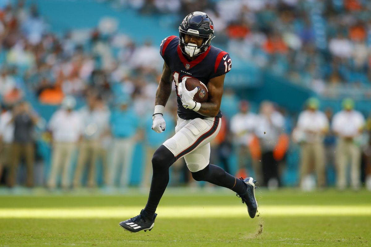 Houston Texans wide receiver Nico Collins (12) runs with the football during the fourth quarter against the Miami Dolphins at Hard Rock Stadium.&nbsp;