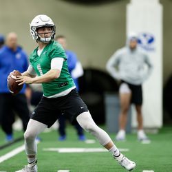 BYU quarterback Zach Wilson participates in team drills as the Cougars football team holds its first spring practice in the Indoor Practice Facility on BYU’s campus in Provo on Monday, March 2, 2020.