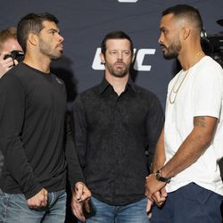 Raphael Assuncao and Rob Font square off at UFC 226 media day.
