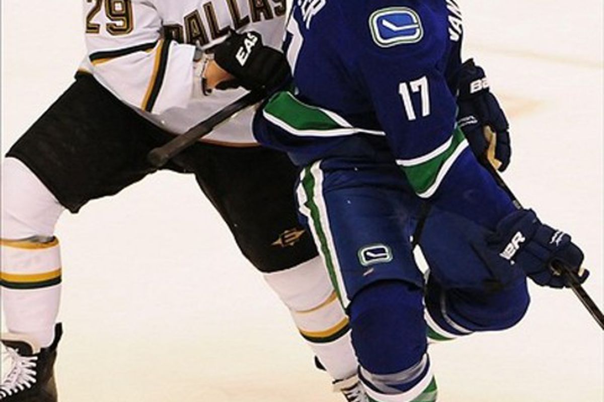 Mar 06, 2012; Vancouver, British Columbia,CANADA; Dallas Stars forward Steve Ott (29) checks Vancouver Canucks forward Ryan Kesler (17) during the first period at Rogers Arena.  Mandatory Credit: Anne-Marie Sorvin-US PRESSWIRE
