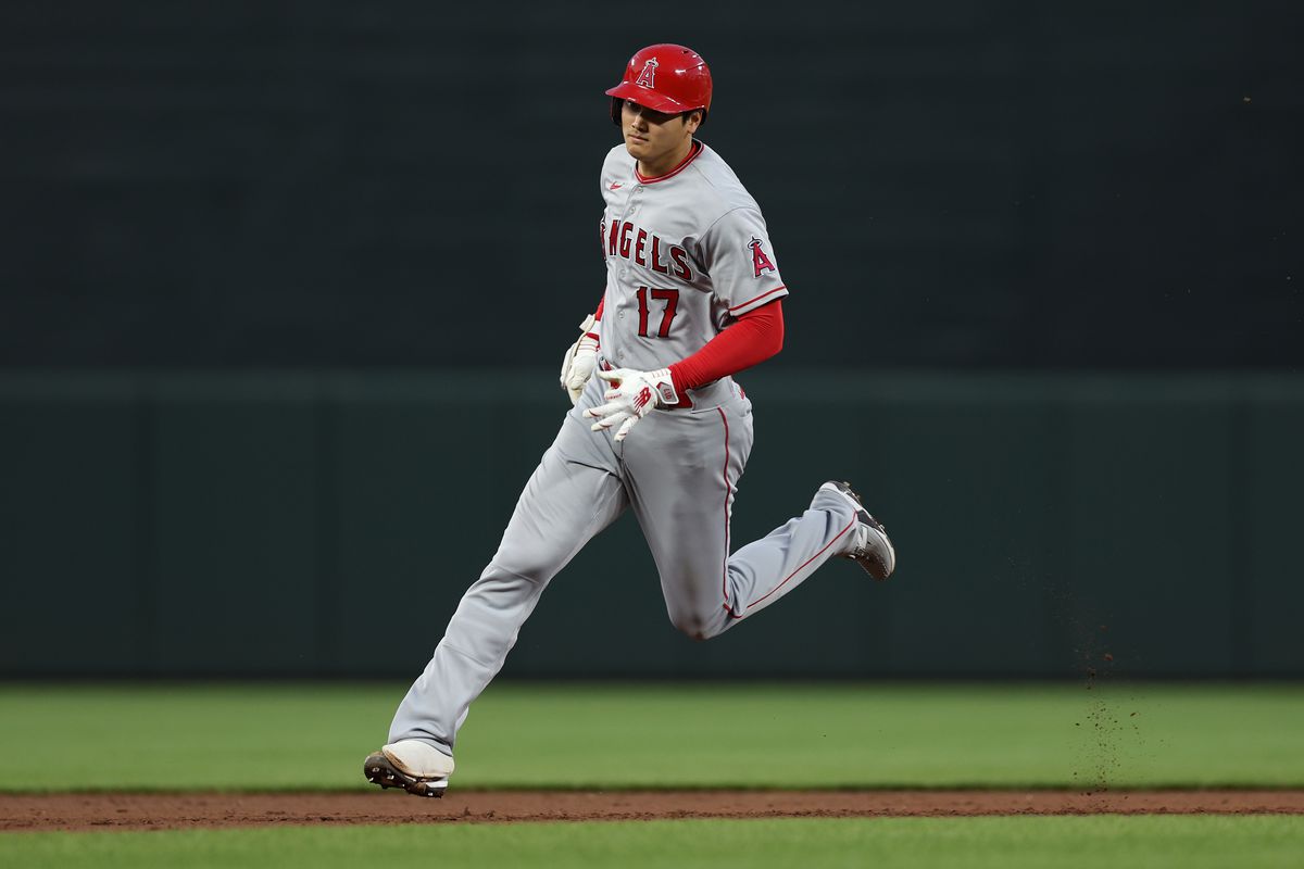 Shohei Ohtani of the Los Angeles Angels runs to third base after hitting a triple during the fifth inning against the Baltimore Orioles at Oriole Park at Camden Yards on May 15, 2023 in Baltimore, Maryland.
