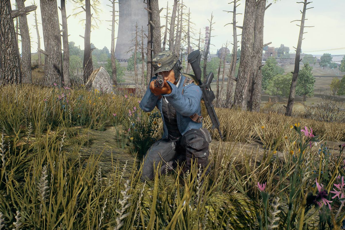Playerunknown’s Battlegrounds - crouching man pointing rifle at you