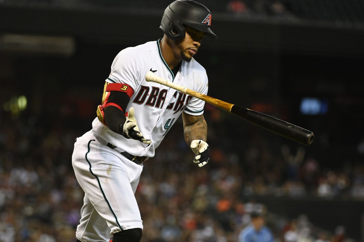 Ketel Marte tosses his bat after hitting a home run against the Colorado Rockies at Chase Field