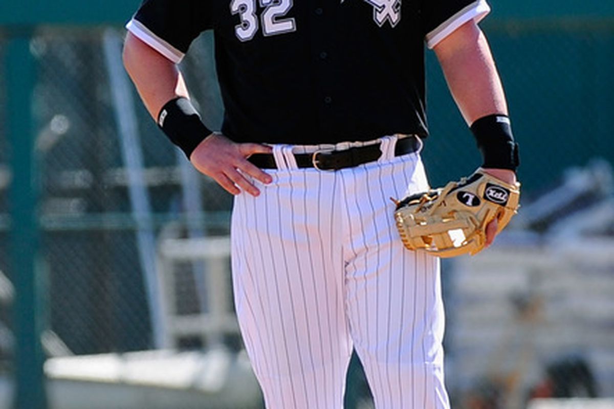 Adam Dunn can do two things at once. (Photo by Kevork Djansezian/Getty Images)