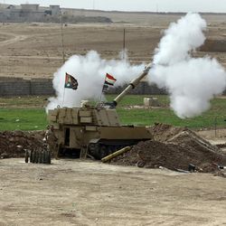 The Iraqi army fires a 155mm shell towards Islamic State militant positions in Mosul, from the village of Ali Rash, east of Mosul, Iraq, Tuesday, Nov. 15, 2016. Iraq launched a major offensive last month to drive IS out of the northern city, the country's second largest, which is still home to more than 1 million civilians. 