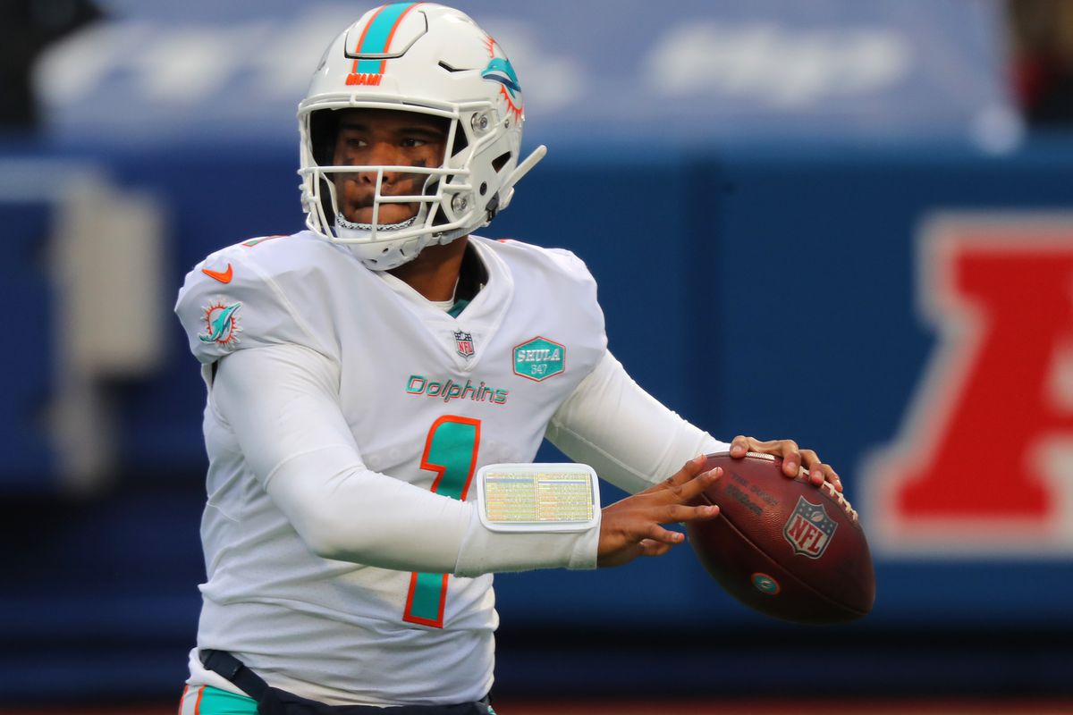 Tua Tagovailoa #1 of the Miami Dolphins looks to throw a pass against the Buffalo Bills at Bills Stadium on January 3, 2021 in Orchard Park, New York.