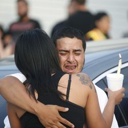 Steve Arceo, husband of Natalia Casagrandes, mourns as family and friends gather during a vigil for Natalia Casagrandes in Magna on Thursday, June 2, 2016. Casagrande, 24, was found dead in her home. Police say Jason Alan Black, 27, who had been at the house before to purchase marijuana, showed up unscheduled, shot Casagrande and then tried to kill her 5-year-old daughter by suffocating her with a pillow.