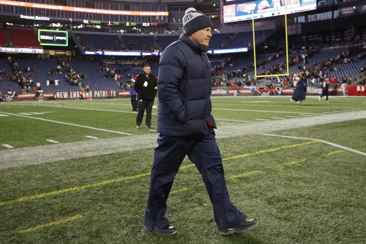 Head coach Bill Belichick of the New England Patriots walks off the field after his team’s 22-18 loss against the Cincinnati Bengals at Gillette Stadium on December 24, 2022 in Foxborough, Massachusetts.