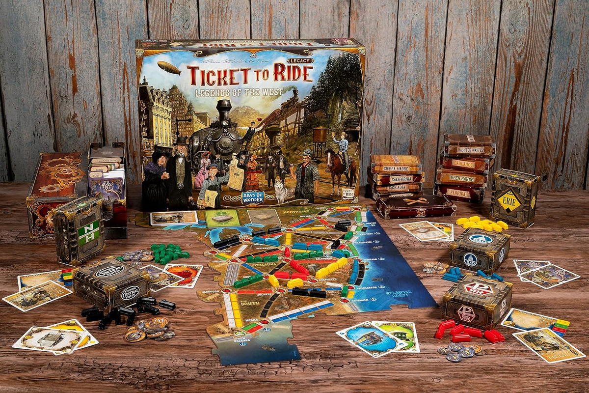 A stock photo of Ticket to Ride Legacy: Legends of the West and its contents