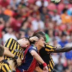 Real Salt Lake forward Devon Sandoval (49) competes with Charleston Battery defender Colin Falvey (32) during the U.S. Open Cup in Sandy on Wednesday, June 12, 2013. RSL won 5-2 in extra time.