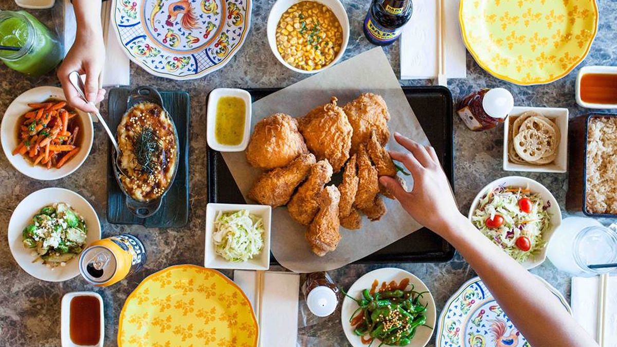 A big table for fried chicken and lots of sides.