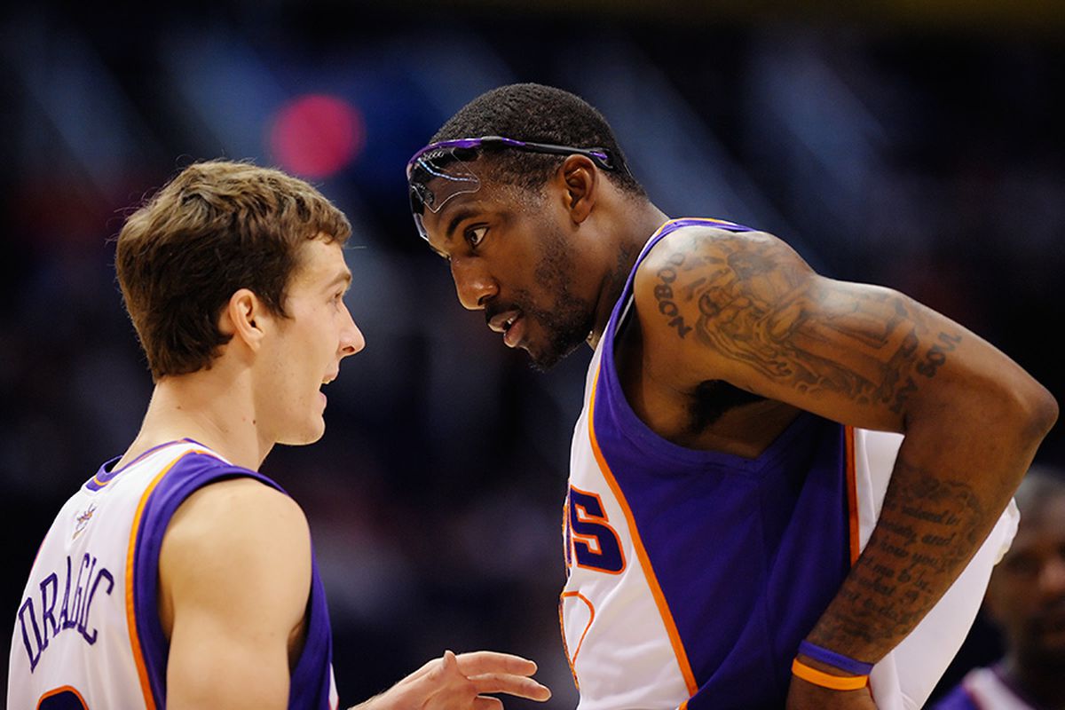 Signs of growth? Phoenix Suns young back up point guard Goran Dragic explains things to Amare Stoudemire during the Suns first preseason game. Photo by Max Simbron