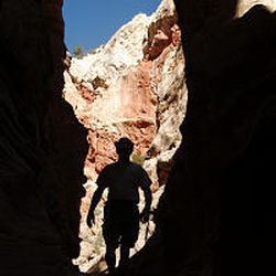 Mike Whitney explores a narrow wash in Cottonwood Canyon in the Grand Staircase in 2003. Visitation to the monument has declined lately.