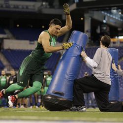 Brigham Young linebacker Alani Fua runs a drill at the NFL football scouting combine in Indianapolis, Sunday, Feb. 22, 2015. 