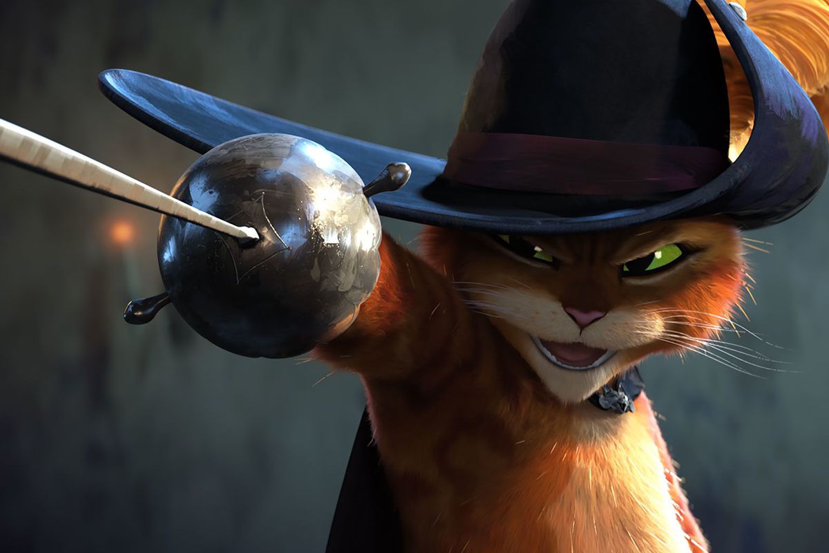 An orange anthropomorphic cat with green eyes wearing a black feathered hat and cloak brandishes a rapier and smiles.