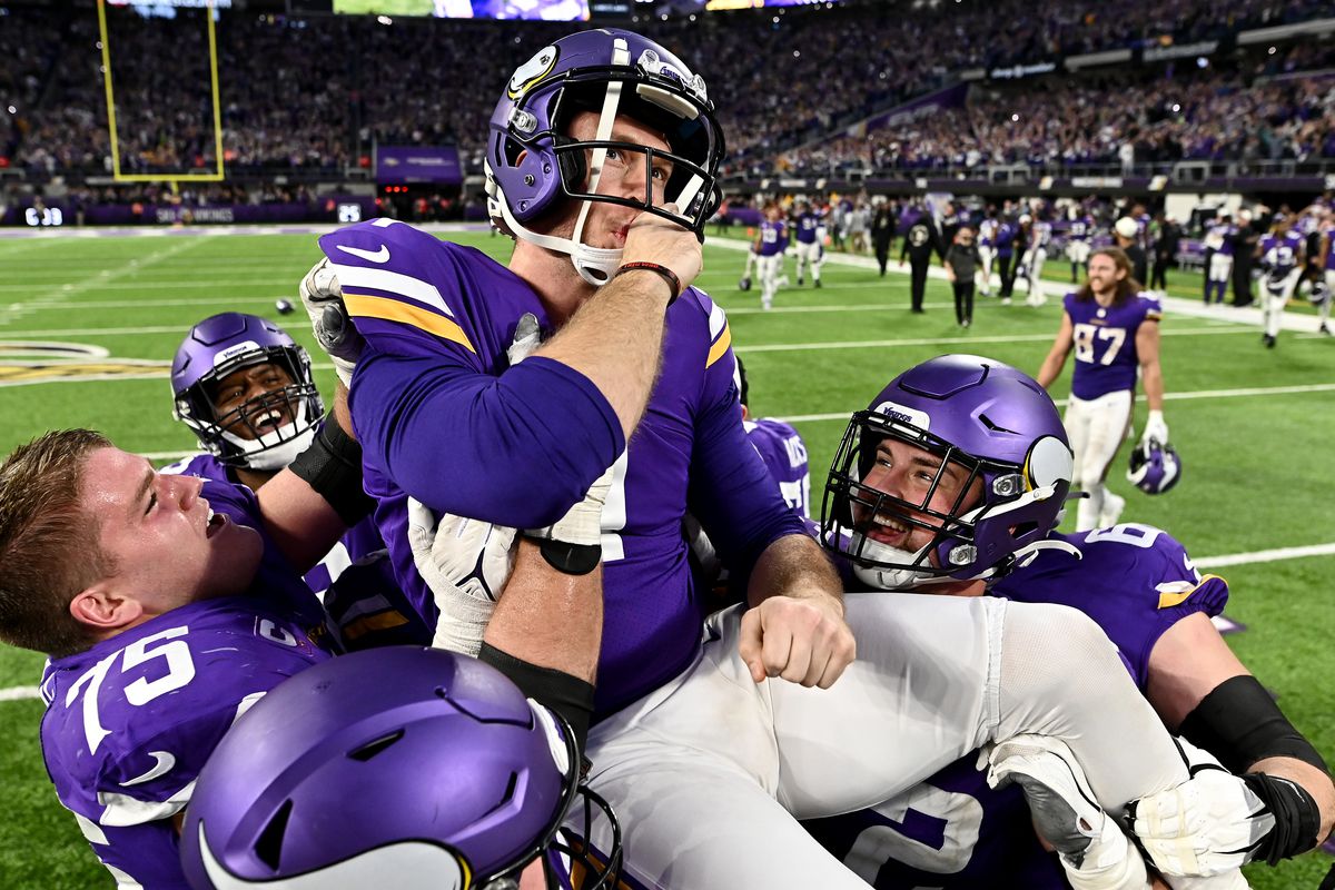 Greg Joseph #1 of the Minnesota Vikings celebrates with teammates after hitting the game winning field goal in overtime against the Indianapolis Colts at U.S. Bank Stadium on December 17, 2022 in Minneapolis, Minnesota.