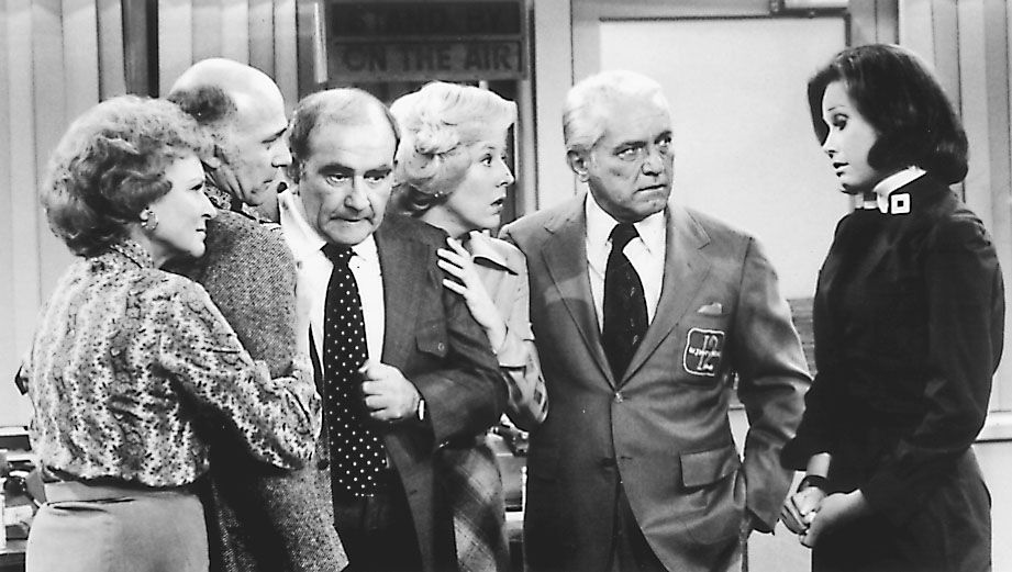 Betty White (from left), Gavin MacLeod, Ed Asner, Georgia Engels, Ted Knight and Mary Tyler Moore are shown in a scene from the CBS series “The Mary Tyler Moore Show.” 
