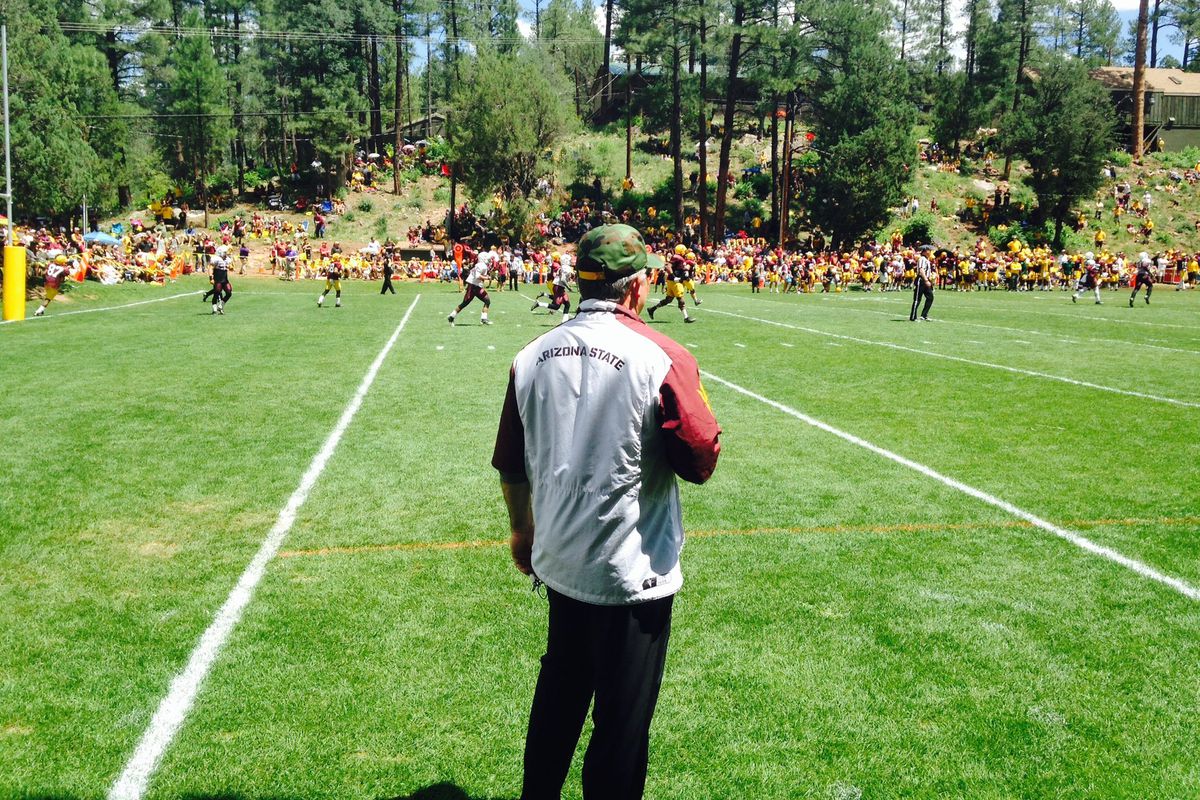 Todd Graham looks on after a Matt Haack punt at the Camp Tontozona scrimmage Saturday morning