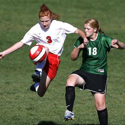 Springville's Autumn Woods, left, attempts a shot in front of Provo's Rachel Pike. Woods is strong enough to face to older foes.
