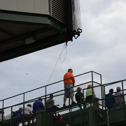 1:06 p.m. Another view of the line for the LF video board net, tied off in the back of the bleachers - 