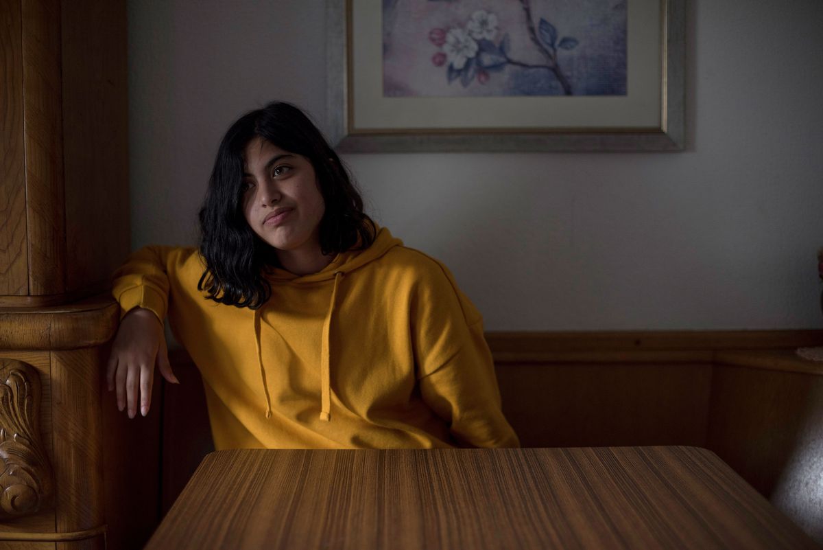 Fourteen-year-old Syrian refugee Hind Al Hammoud in her family’s kitchen in Neu-Anspach, Germany, on Friday, Sept. 13, 2019. Al Hammoud traveled with her family from their war-torn city to a small village in the Taunus mountain range of Germany where they are all working to integrate and heal from the trauma of the war and their flight.
