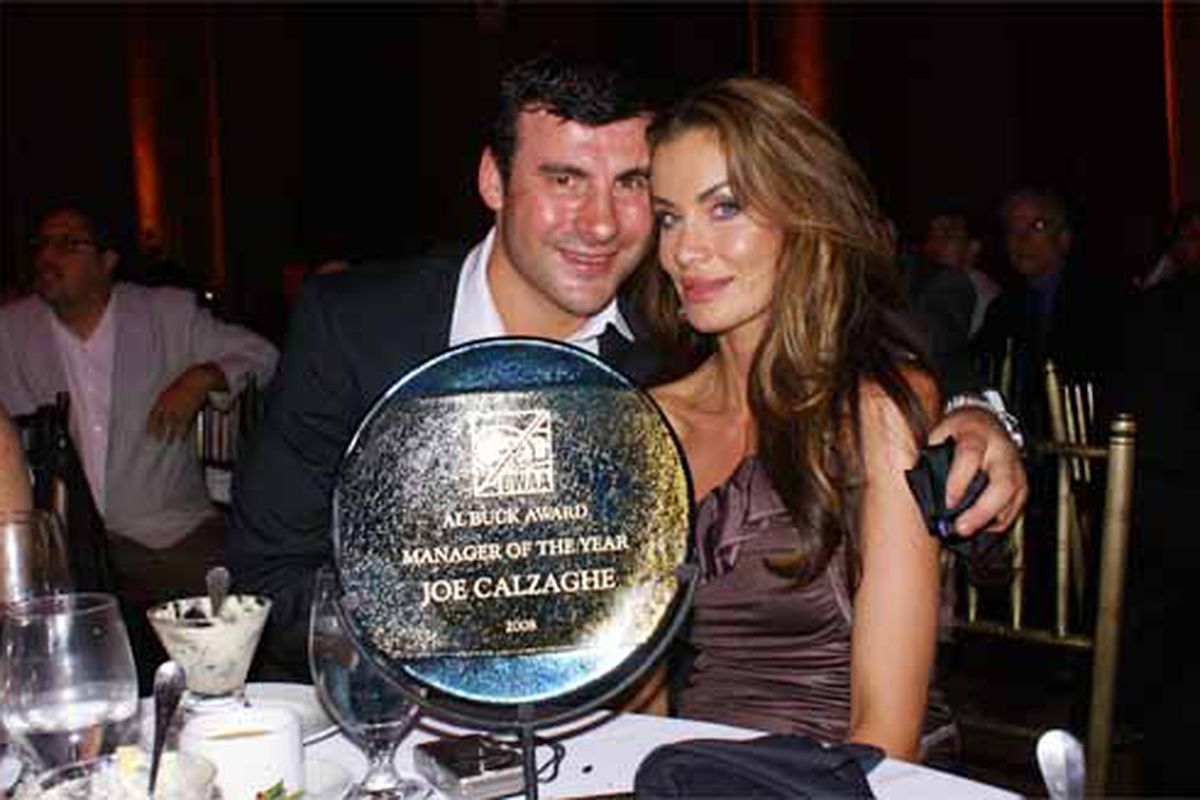 Joe Calzaghe accepted his bizarre "Manager of the Year" award at the BWAA awards recently. He says he's still not returning to the ring. (via <a href="http://blogs.trb.com/sports/boxing/blog/calzaghe-wife%20copy.jpg">blogs.trb.com</a>)
