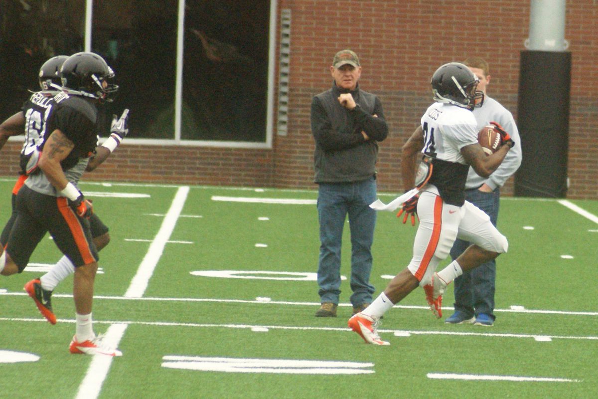 Storm Woods storms away from the Oregon St. secondary for an 80 yard touchdown run in today's scrimmage.