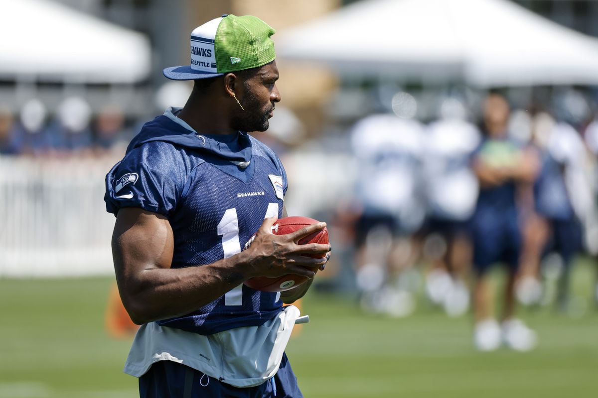 Seattle Seahawks wide receiver DK Metcalf (14) stands on the sidelines during training camp practice at Virginia Mason Athletic Center.&nbsp;