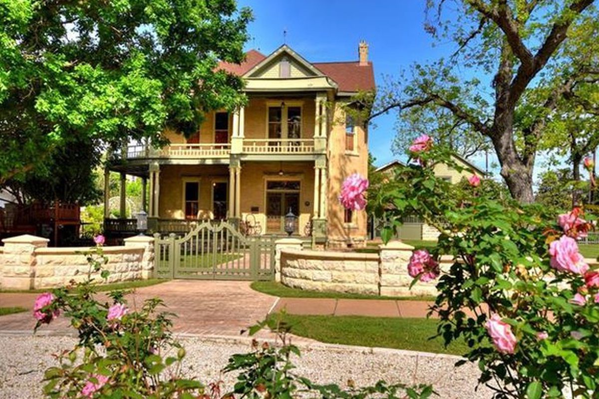Two-story Victorian with large porch and second-floor veranda