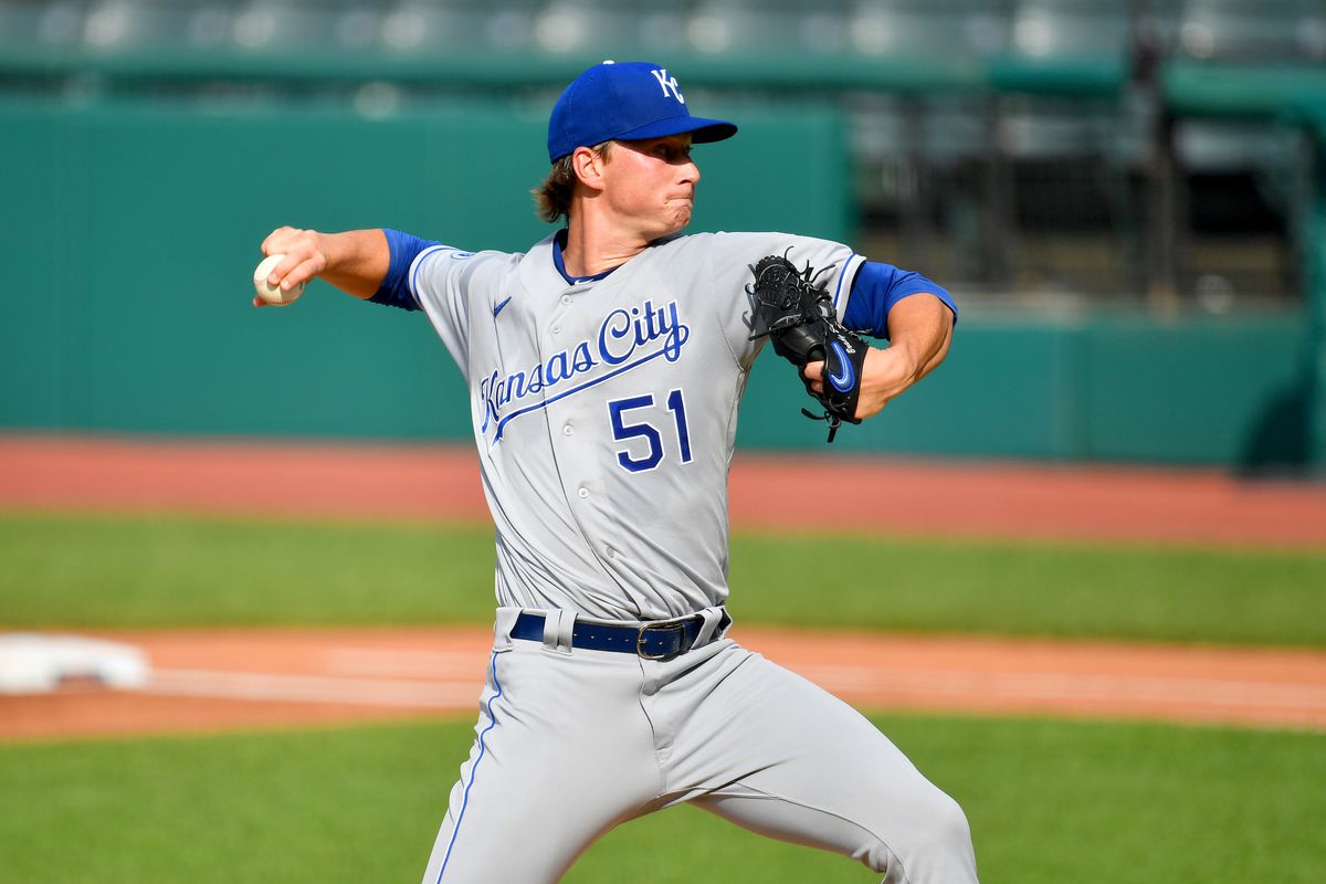 Starting pitcher Brady Singer #51 of the Kansas City Royals pitches during the first inning against the Cleveland Indians at Progressive Field on July 25, 2020 in Cleveland, Ohio. The 2020 season had been postponed since March due to the COVID-19 pandemic.