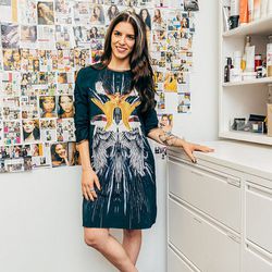 <strong>The Office:</strong> Marie Claire <br><br>
<strong>The Employee:</strong> Jennifer Goldstein, Executive Beauty and Health Editor<br><br>
<b>The Outfit:</b> Clover Canyon dress, Saint Laurent boots, a Pamela Love silver wrought-iron cuff, a Campb