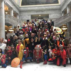 Costumed fans pose for a photo during the FanX Salt Lake Comic Convention press conference on Wednesday, April 11, 2018, at the state Capitol in Salt Lake City.