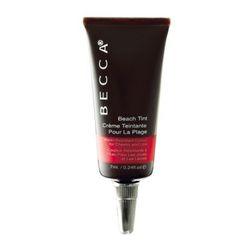 Becca Beach Tint in Lychee, <a href="http://www.sephora.com/product/productDetail.jsp?keyword=BECCA%20Beach%20Tint%20P375978&skuId=929513&productId=P375978&_requestid=358280">$25</a>. "Convertible color is key when I'm looking to save room (and time in my
