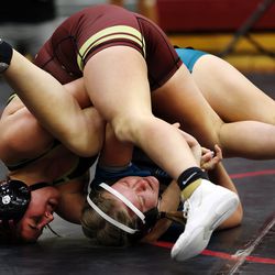 Abigail Archibald of Maple Mountain and Jessica Hacking of Farmington wrestle in the 150 weight class at the 5A/3A/2A/1A girls wrestling state championship meet at Mountain View High School in Orem on Wednesday, Feb. 17, 2021.
