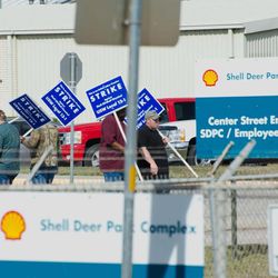 Representatives from Deer Park United Steelworkers Local 13-1 hold picket signs outside the Shell Deer Park Refinery as the Union calls for strikes against the Shell refinery and chemical plants in Deer Park, Texas, Sunday, Feb. 1, 2015. 