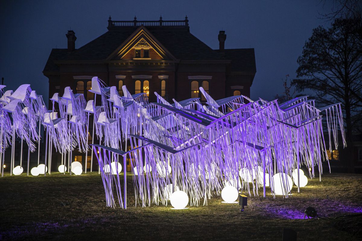 A memorial commissioned by Illinois first lady M.K. Pritzker and Gov. J.B. Pritzker for the lives lost to the COVID-19 pandemic in Illinois, is illuminated for the first time on the north lawn of the Illinois governor’s mansion in Springfield, Ill., Tuesday, March 16, 2021,