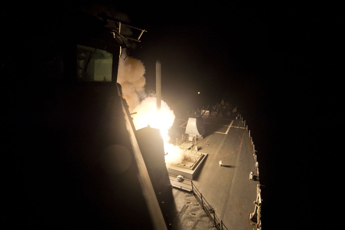 The guided-missile destroyer USS Arleigh Burke launches Tomahawk cruise missiles against Syria from the Red Sea (Carlos M. Vazquez II/U.S. Navy via Getty Images)