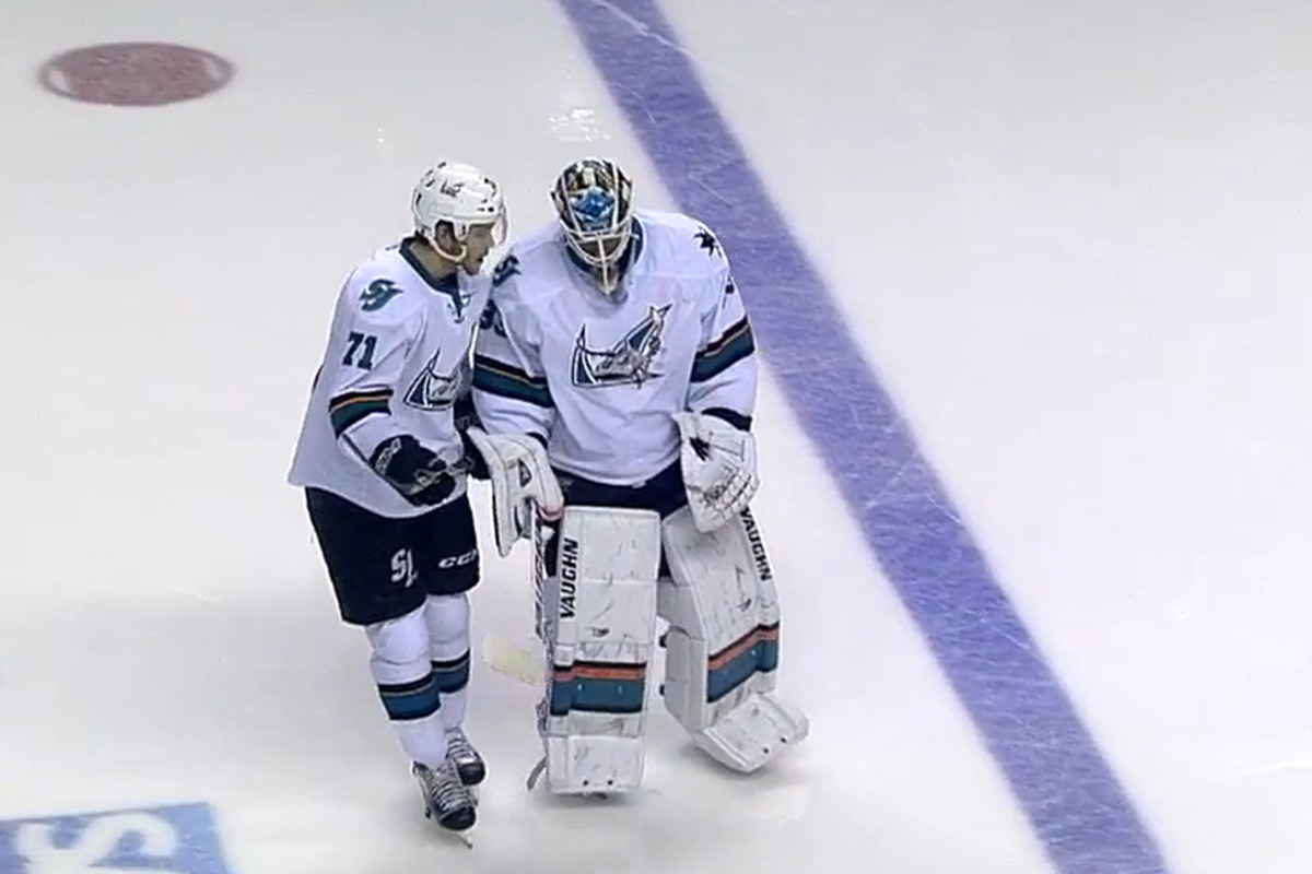 San Jose Barracuda forward Jon Martin and goaltender Mantas Armalis discuss strategy prior to the start of the second period Sunday evening at SAP Center. (AHL Live)