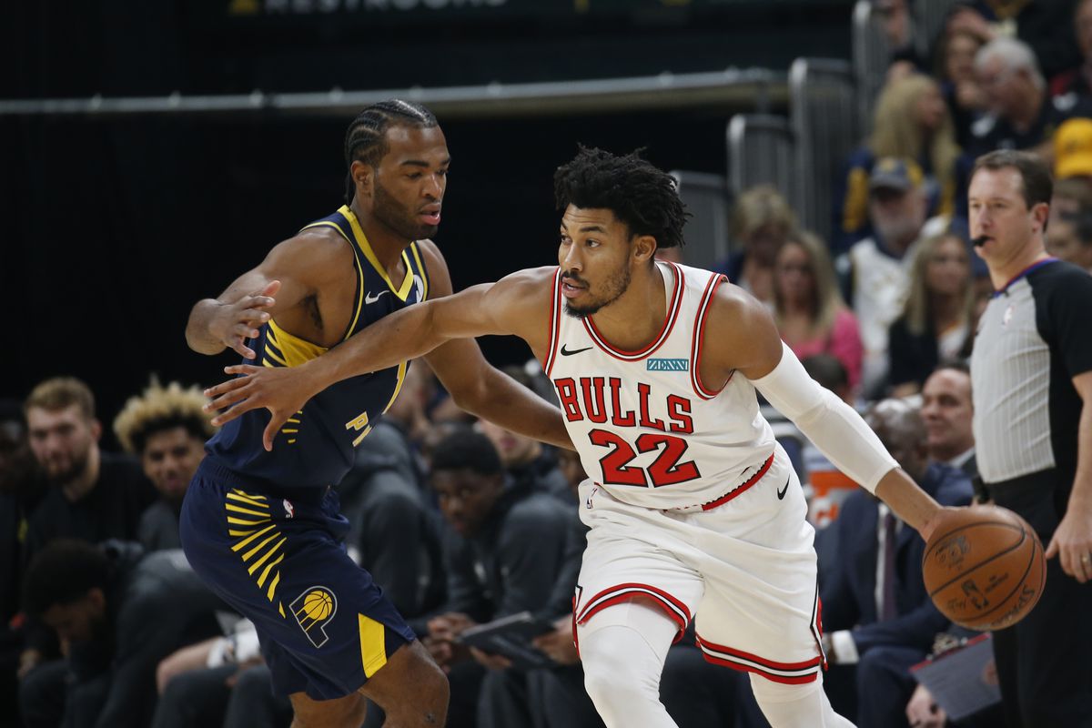 Chicago Bulls forward Otto Porter Jr. is guarded by Indiana Pacers forward T.J. Warren during the first quarter at Bankers Life Fieldhouse.