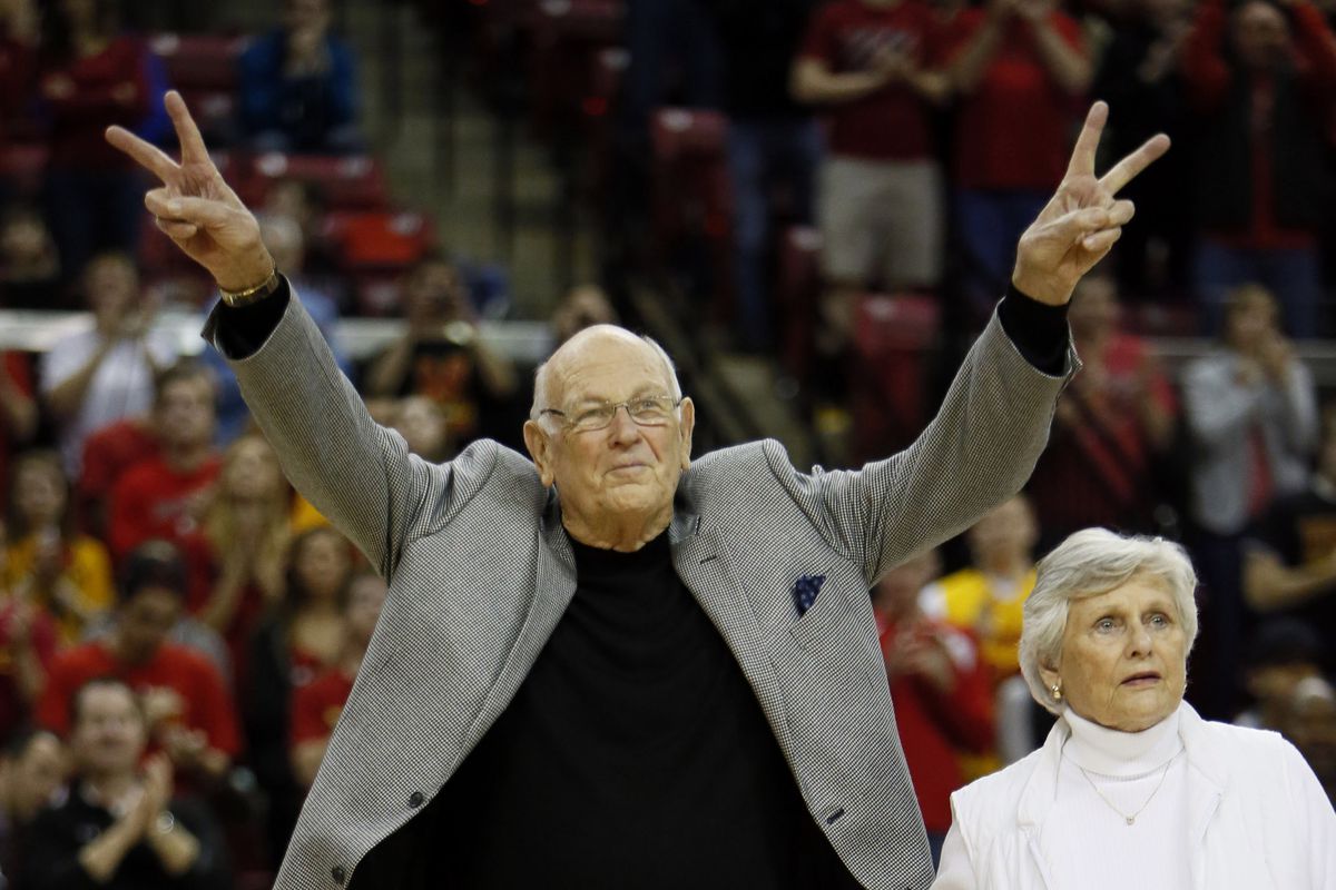 Terrapins former head coach Lefty Driesell and his wife Joyce Driesell respond to fans while being honored at halftime of the game against Clemson Tigers at Comcast Center.