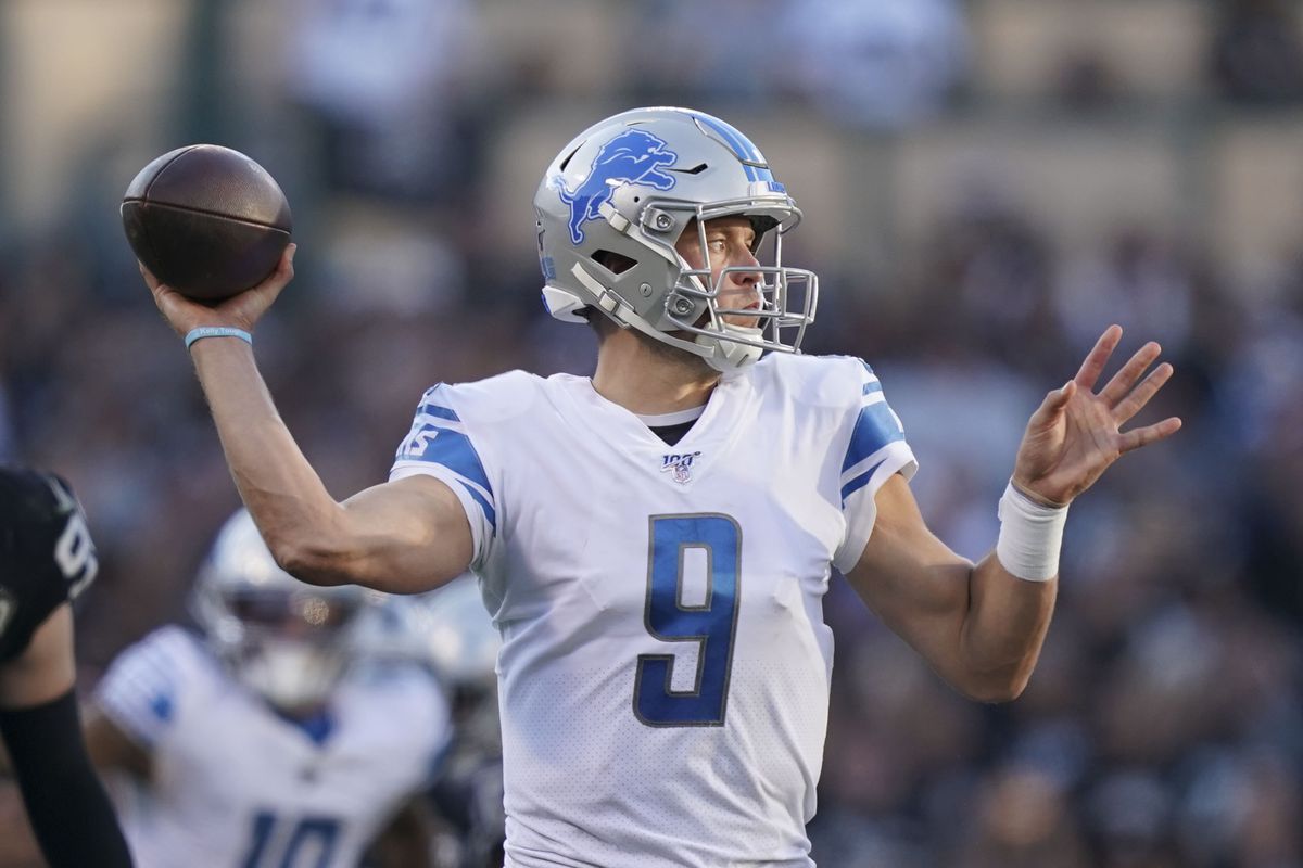 Detroit Lions quarterback Matthew Stafford passes the football against the Oakland Raiders during the fourth quarter at Oakland Coliseum.