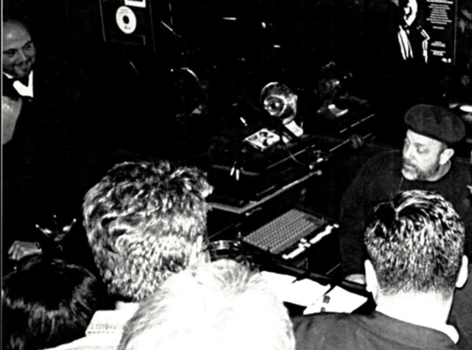 Keyboardist Nick Russo (far left) looks on as Piano Man Billy Joel sits in on his equipment at Jilly’s. | supplied photo
