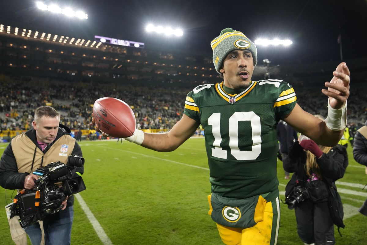 Jordan Love #10 of the Green Bay Packers celebrates defeating the Kansas City Chiefs 27-19 at Lambeau Field on December 03, 2023 in Green Bay, Wisconsin.