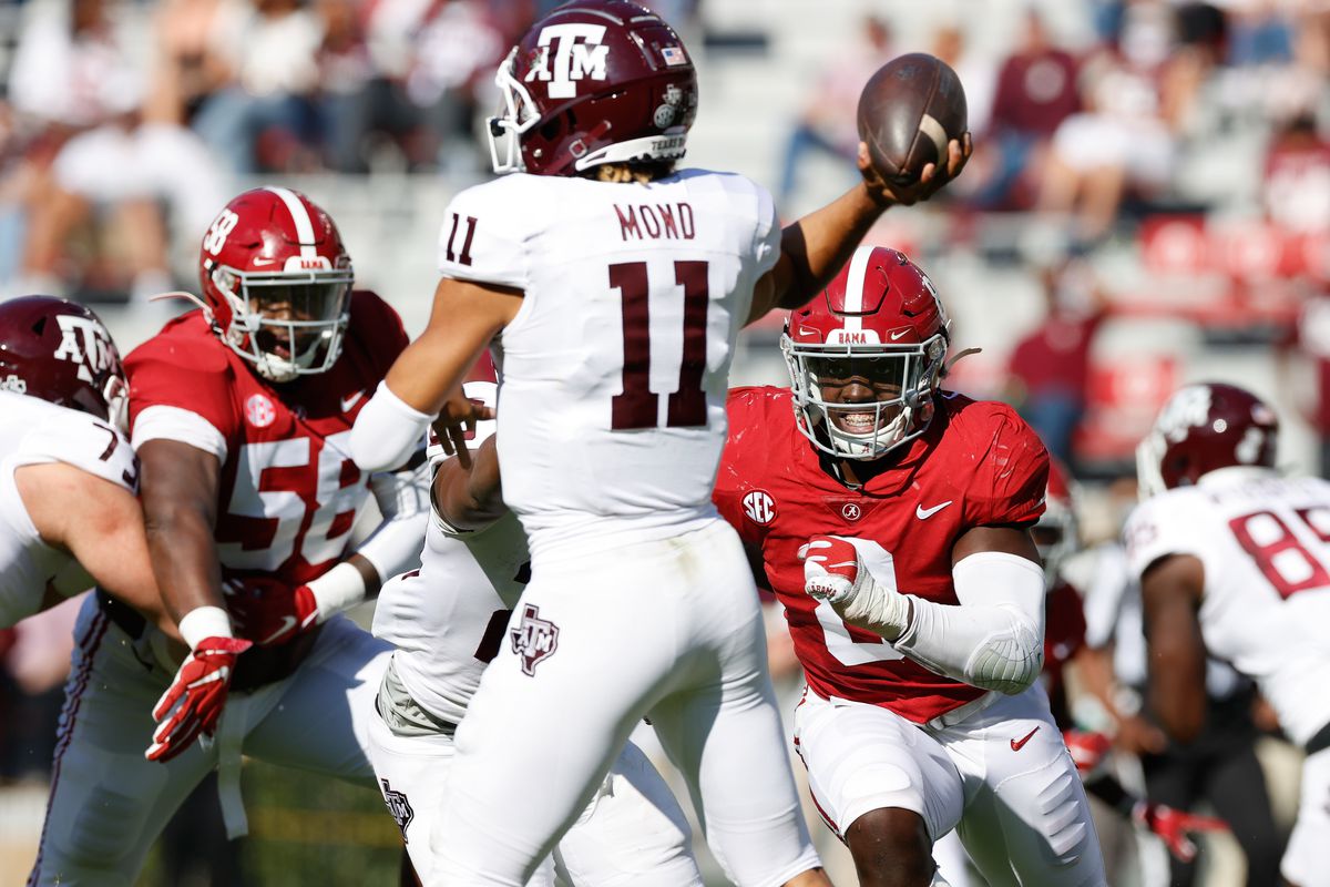 Christian Harris of the Alabama Crimson Tide rushes Kellen Mond of the Texas A&amp;M Aggies on October 3, 2020 at Bryant-Denny Stadium in Tuscaloosa, Alabama.
