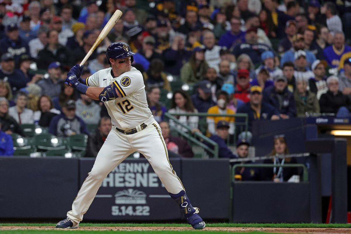 Hunter Renfroe #12 of the Milwaukee Brewers at bat against the St. Louis Cardinals during Opening Day at American Family Field on April 14, 2022 in Milwaukee, Wisconsin. The Brewers defeated the Cardinals 5-1.