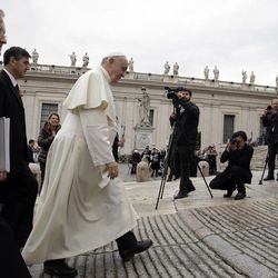 Pope Francis arrives in St. Peter's Square to attend the weekly general audience at the Vatican, Wednesday, Nov. 12, 2014. 